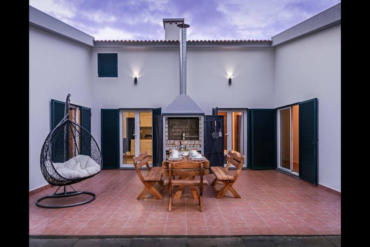 Full Patio area with a table and chairs