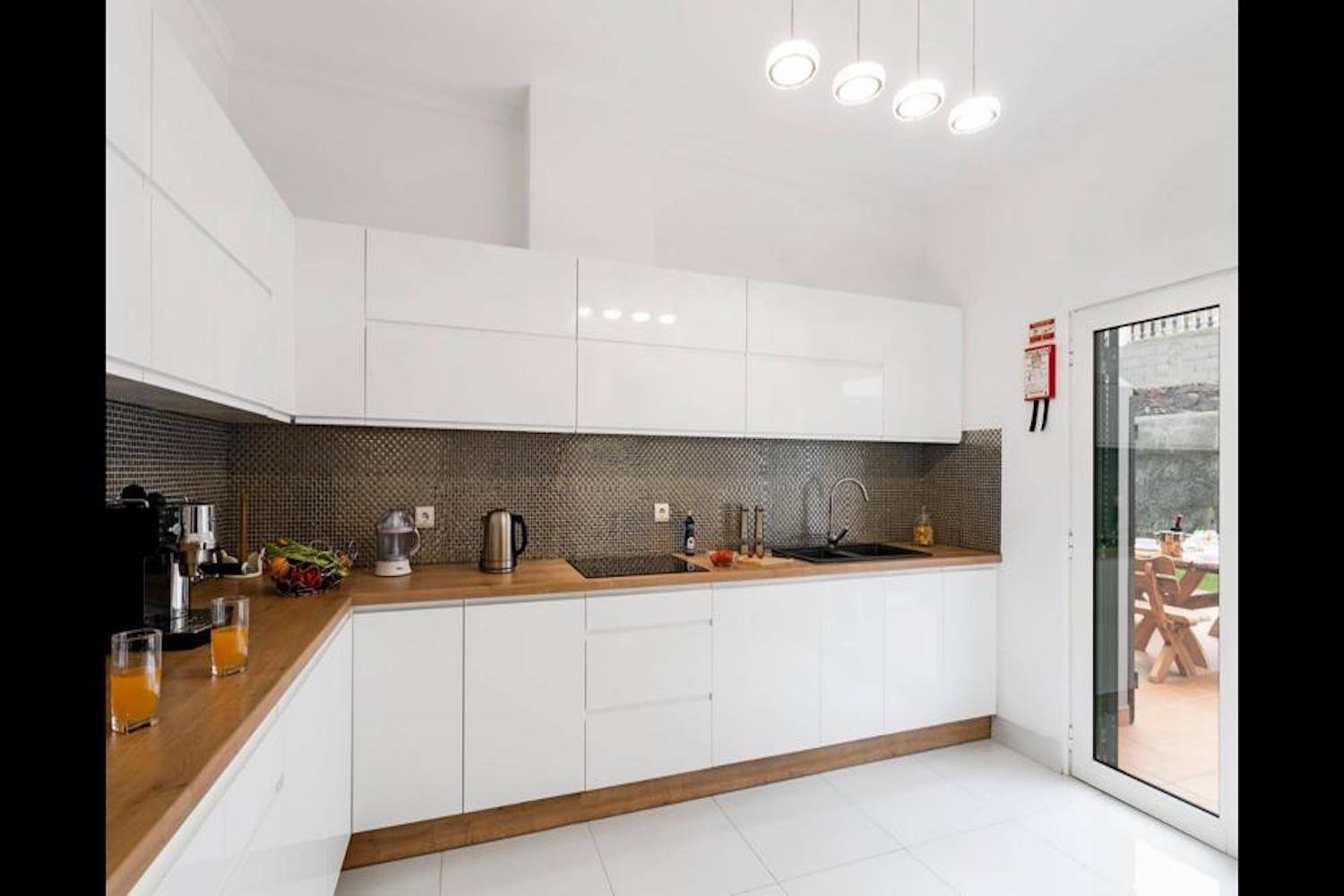 Kitchen with white cupboards 