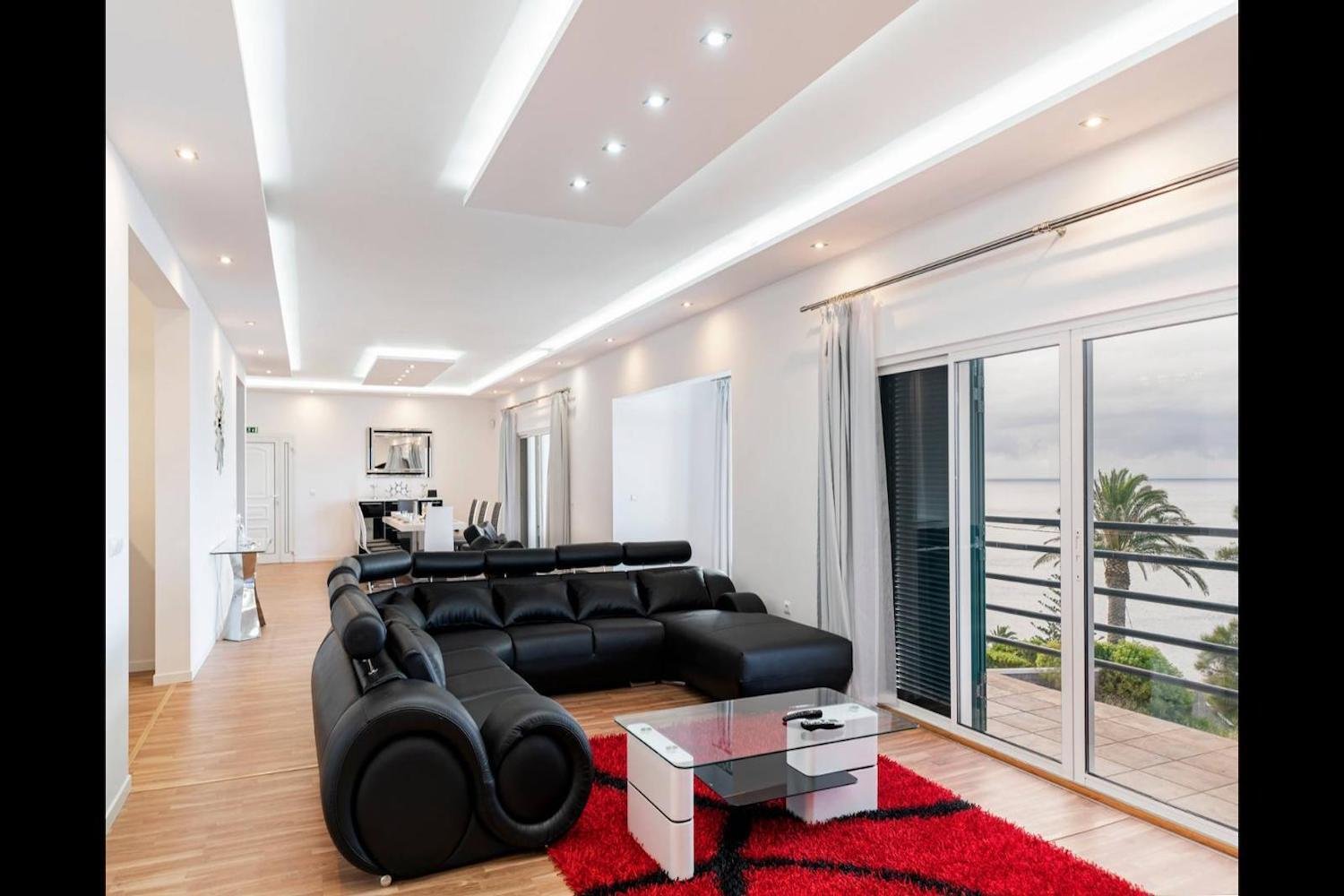 Lounge Area with sofa and sea views from the veranda