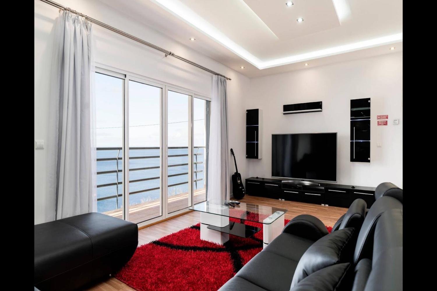 Lounge with sofas and TV