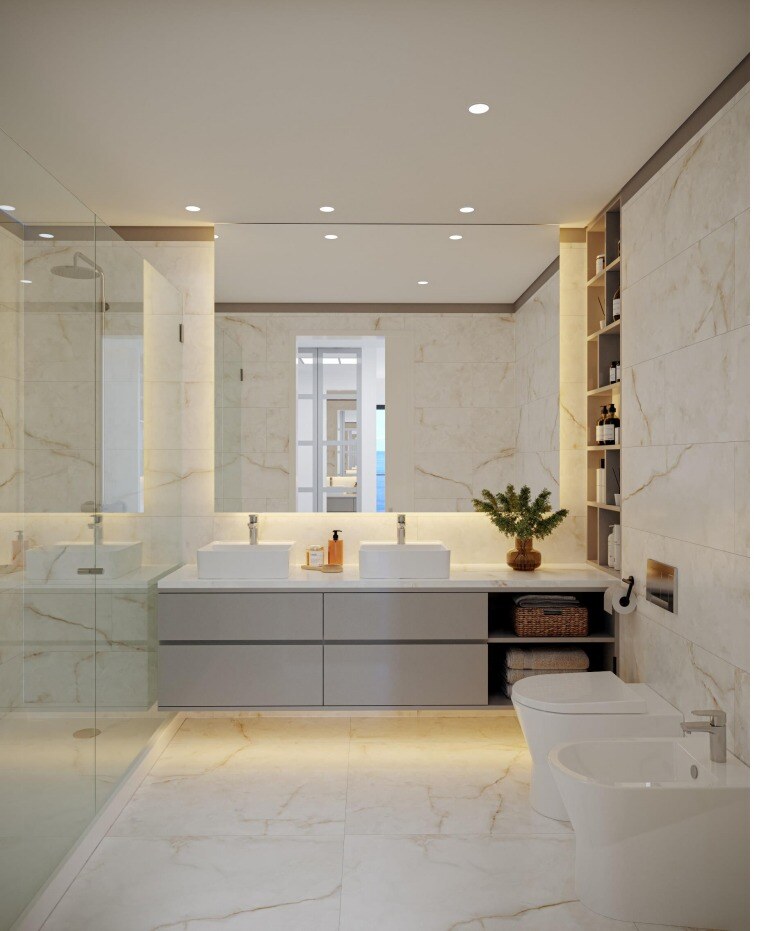 Bathroom with 2 hand basins, a toilet seat, a bide and a shower