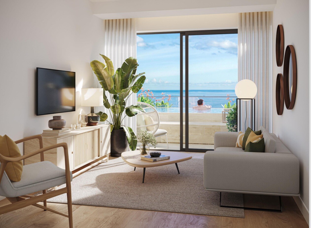 Lounge with sofa, television and sea view