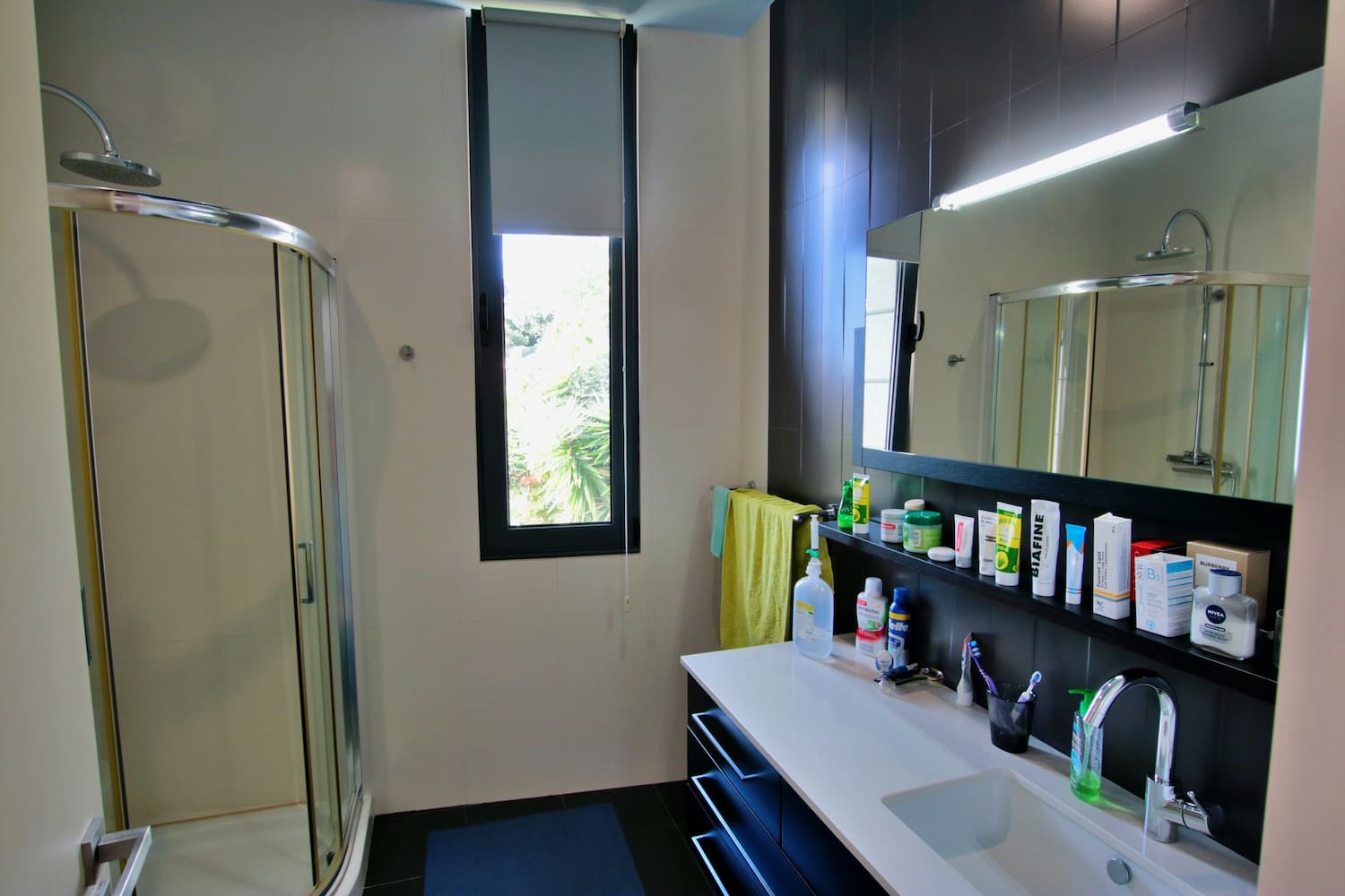 Bathroom with SHOWER and hand basin