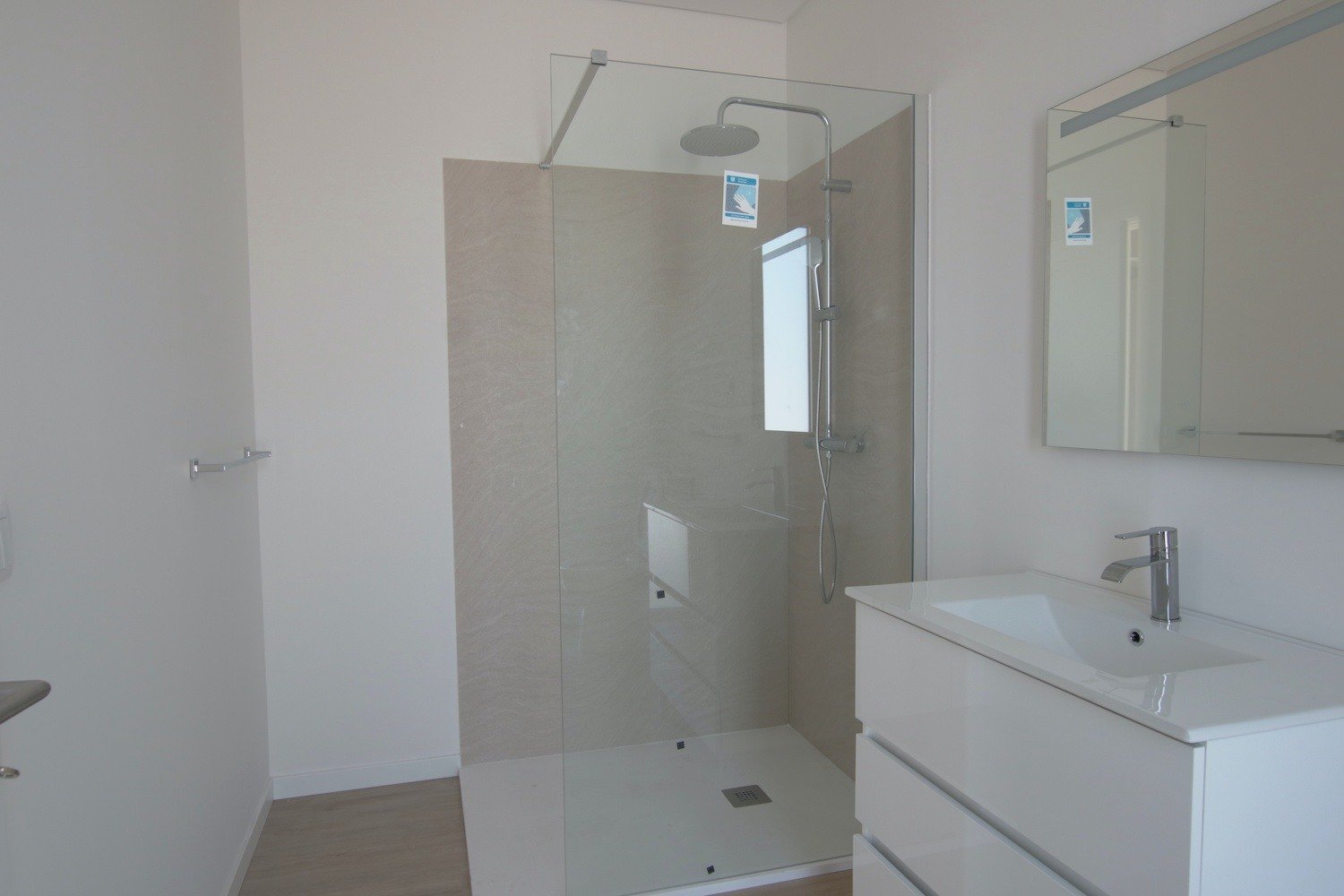 Bathroom with hand basin and shower