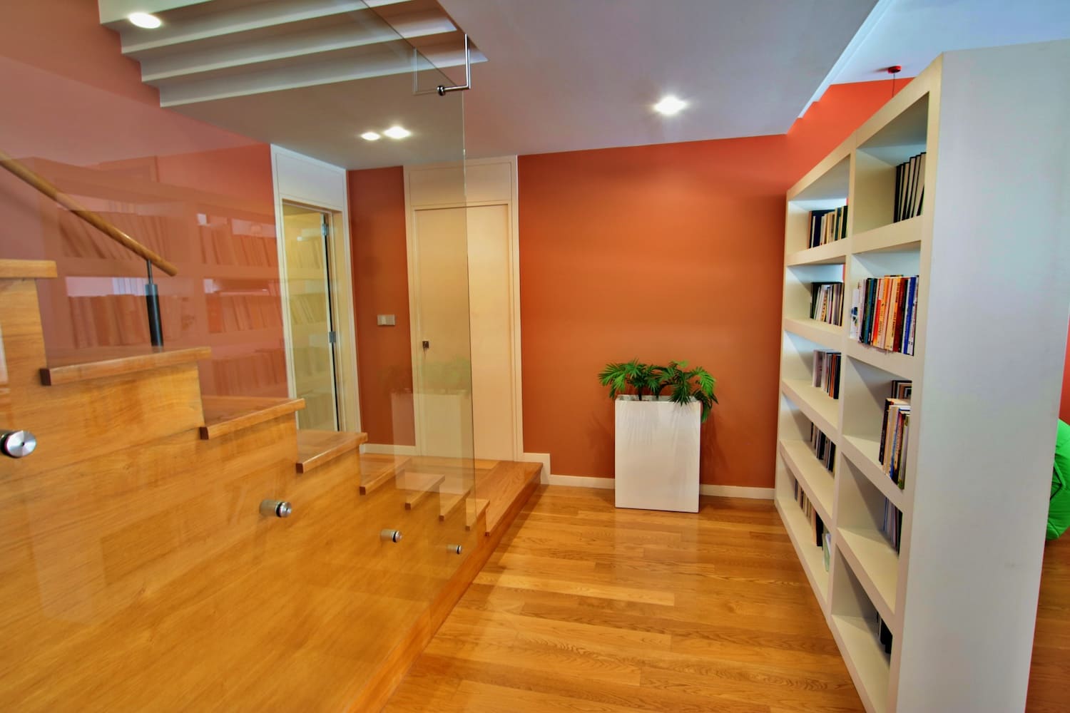 WOODEN STAIRWAY and bookshelf
