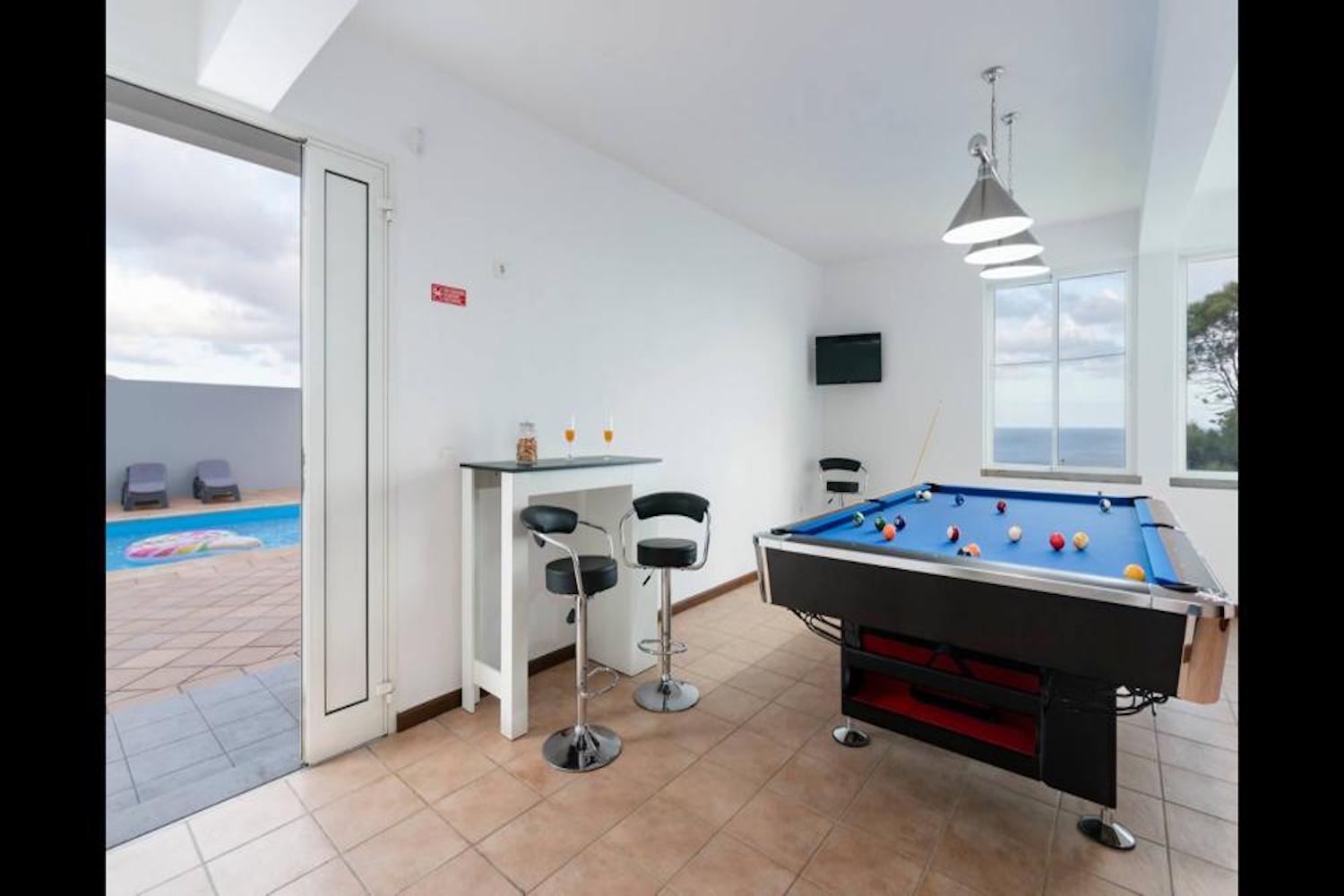 Snooker table with enterance to the snooker room